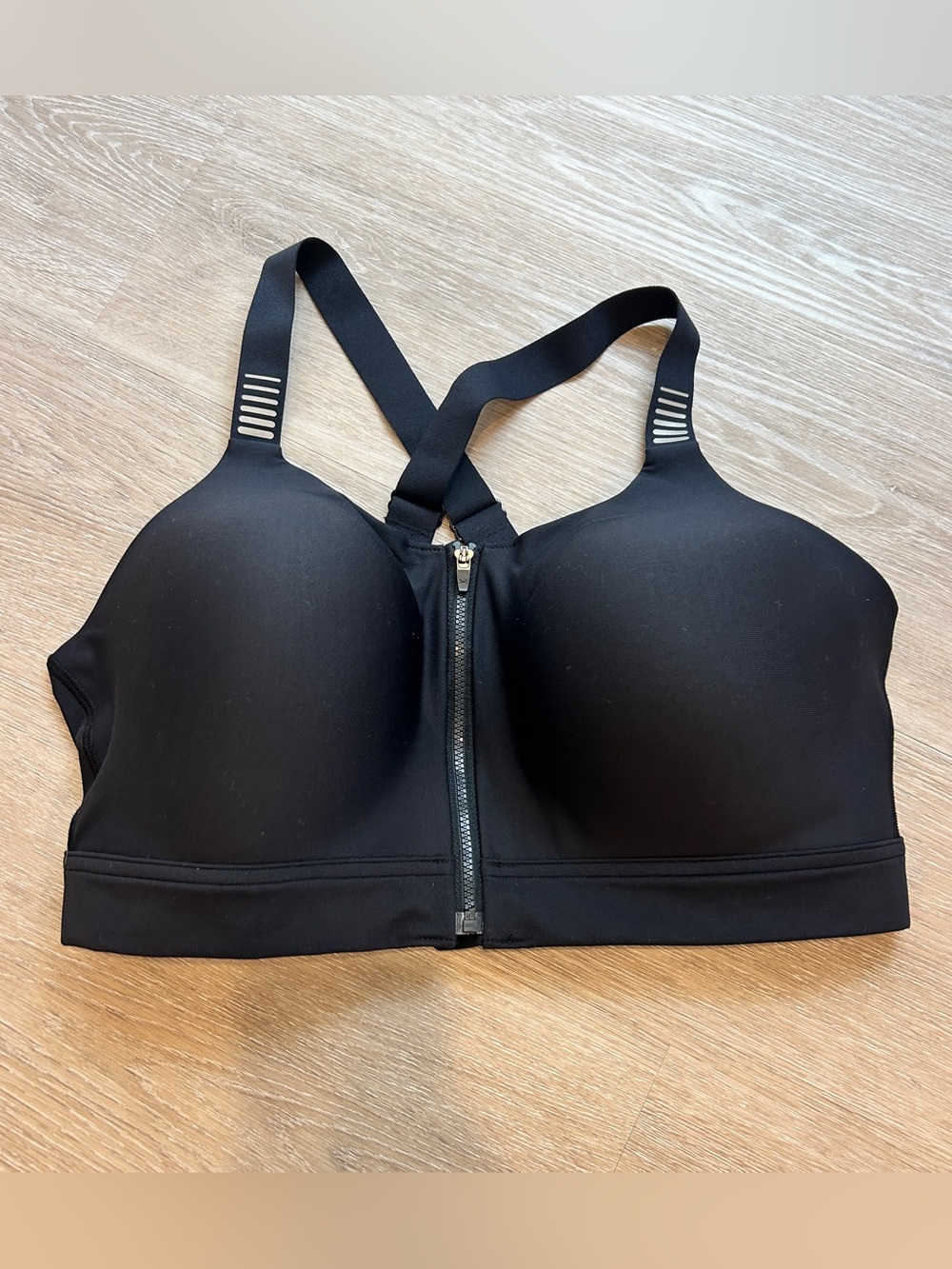 Under Armour black sports bra with zipper in size 38DD